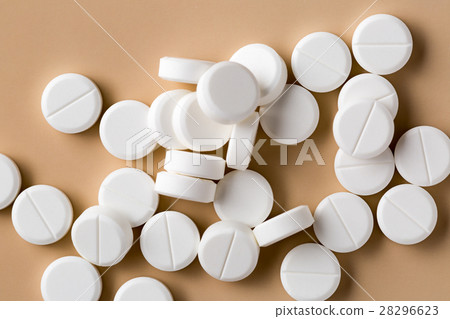 Heap of round white pills Heap of round white pills 28296623