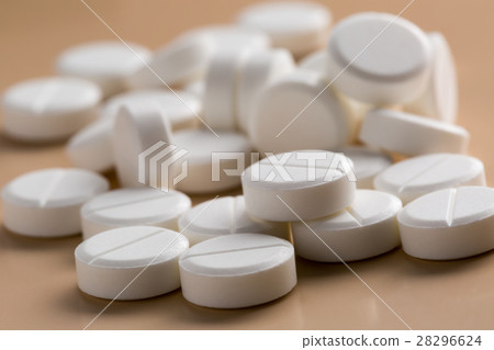 Heap of round white pills 28296624