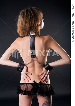 sexy woman with chain and collar. Back view sexy woman with chain and collar. Back view 28297625
