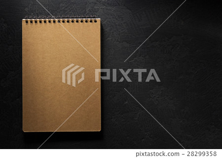 notebook on black background notebook on black background 28299358