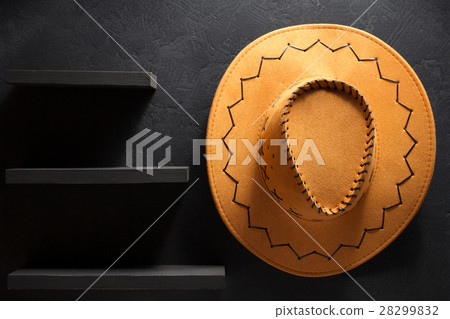 cowboy hat on wooden background. 28299832