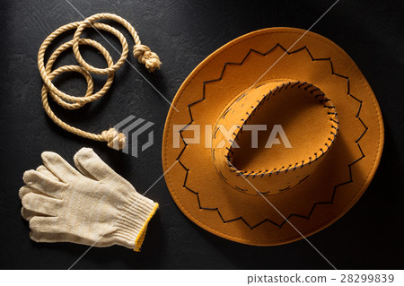 cowboy hat on wooden background. 28299839