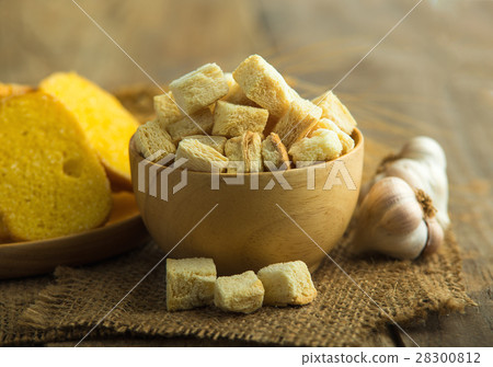 Crispy Bread in wood bowl on table 28300812