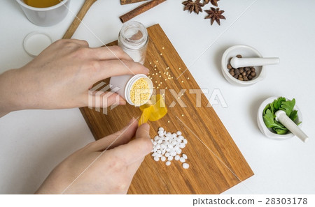 Woman is preparing home made cosmetics or makeup. 28303178