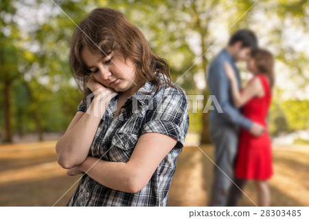 Jealousy girl seeing her boyfriend flirting 28303485