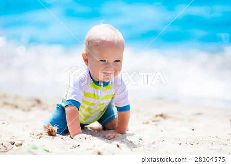 Baby boy on tropical beach Baby boy on tropical beach 28304575