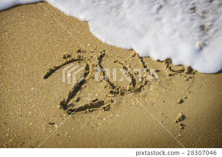 Abstract 2018 on a beach sand background 28307046