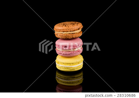Colorful macaroon over black background 28310686