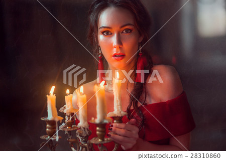 Beautiful lady with candles Beautiful lady with candles 28310860