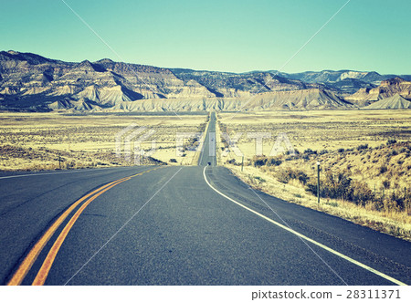 Retro old film stylized asphalt road. Retro old film stylized asphalt road. 28311371