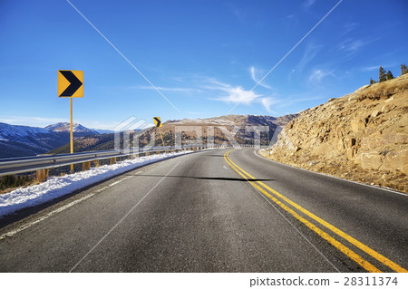 Mountain asphalt road turn. Mountain asphalt road turn. 28311374