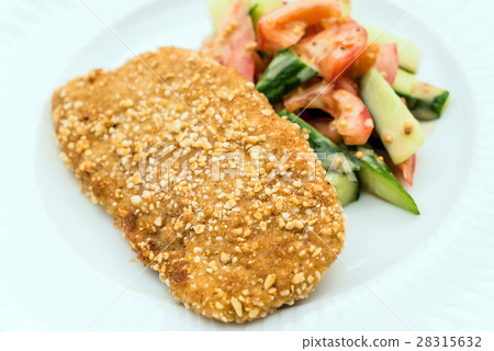 Schnitzel with salad Schnitzel with salad 28315632