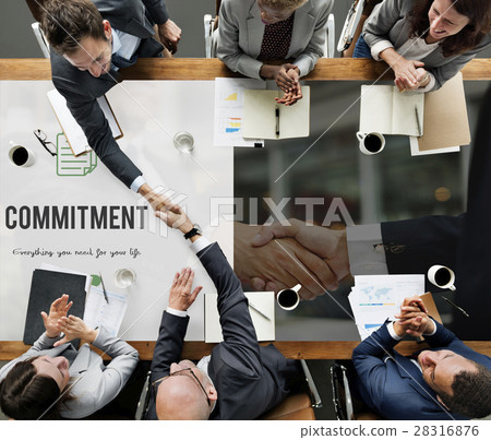 Commitment word on business handshake background Commitment word on business handshake background 28316876