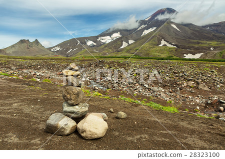 Pyramid of stones on a background of Avacha 28323100