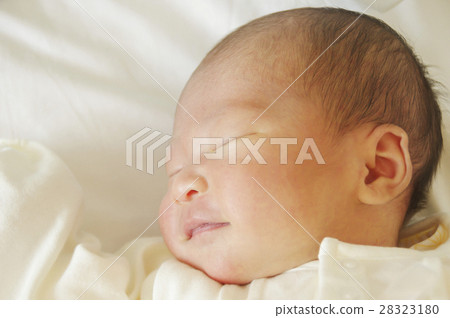 Newborn smile Newborn smile 28323180
