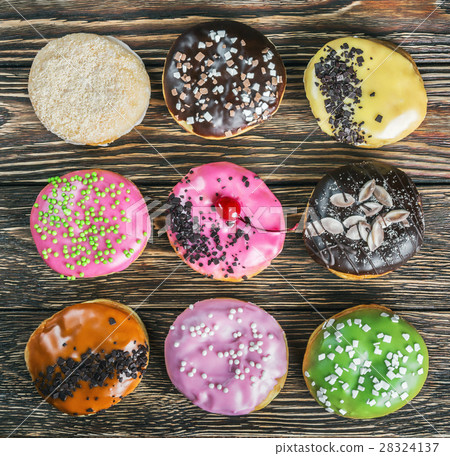 fresh baked glazed donuts   28324137