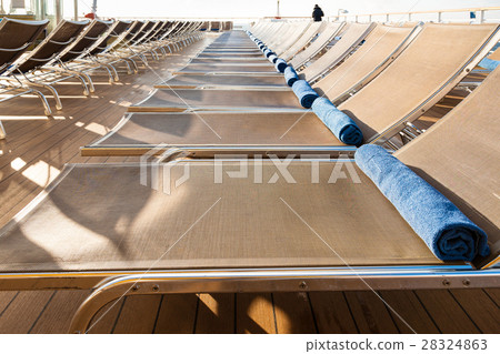 outdoor lounge area on stern of cruise liner 28324863