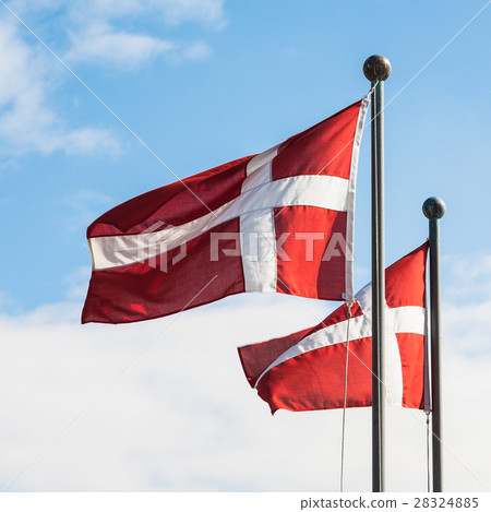 two danish flags fluttering in wind 28324885