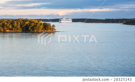 view of cruise liner and sea coastline in sunset 28325143