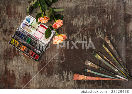 paint brushes and tubes of oil paints on wooden paint brushes and tubes of oil paints on wooden 28329488