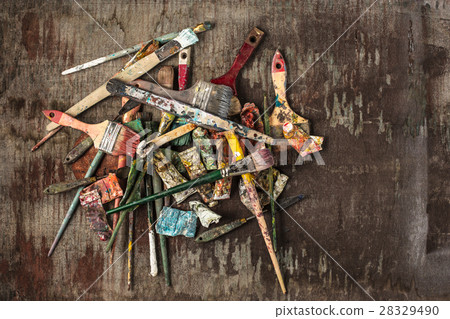 paint brushes and tubes of oil paints on wooden paint brushes and tubes of oil paints on wooden 28329490