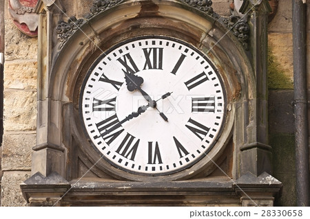 Old clock on a tower Old clock on a tower 28330658