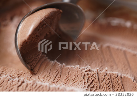 scooping chocolate ice cream close up shot 28332026