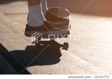 Feet on a skateboard. Feet on a skateboard. 28335771