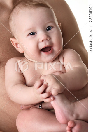 Smiling baby having fun 28336194