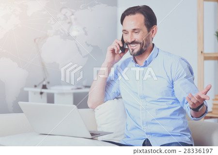 Positive man talking on cell phone 28336197