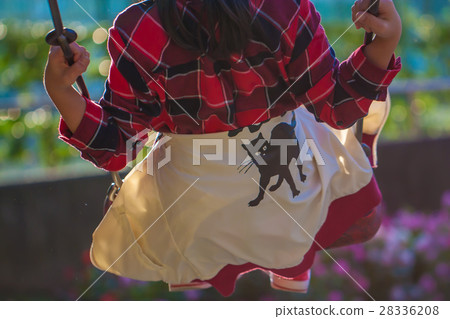 Children playing on a swing Children playing on a swing 28336208