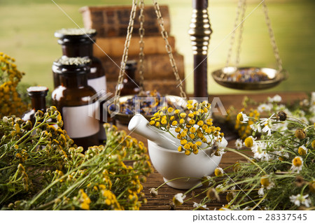 Herbal medicine on wooden desk background 28337545