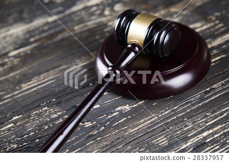 Law theme, mallet of the judge, wooden desk  28337957
