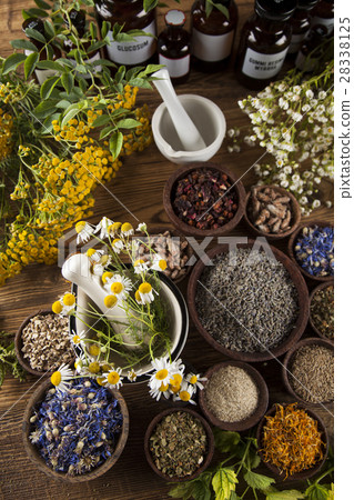 Natural medicine on wooden table background 28338125