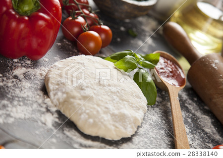 Homemade italian pizza preparation 28338140