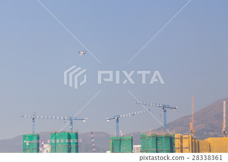 Drone doing surveillance take aerial photographs Drone doing surveillance take aerial photographs 28338361