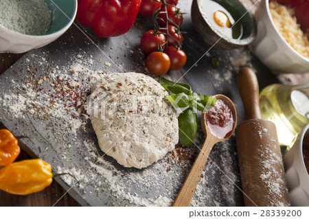 Homemade italian pizza preparation 28339200