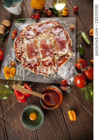 Delicious pizza served on wooden table Delicious pizza served on wooden table 28339398