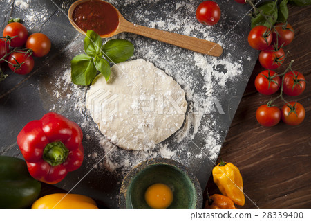 Homemade italian pizza preparation 28339400