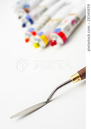 palette knife and oil paint tubes on canvas 28340859