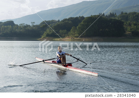 Child in the course of rowing on single 28341040