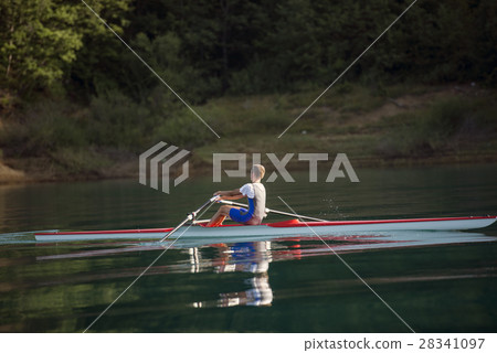 single rower at sunrise 28341097