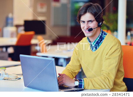 Pleasant man working in the office 28341471