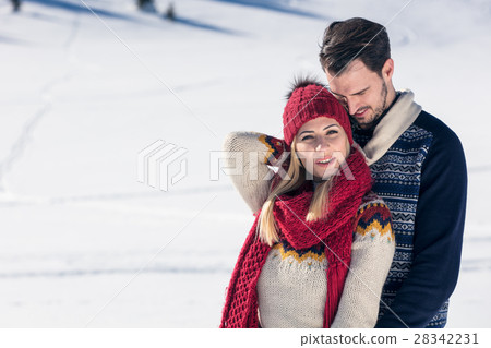 Happy Couple Having Fun on snow mountain. 28342231