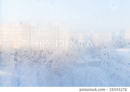 Ice pattern on window, winter background. Texture. 28343278