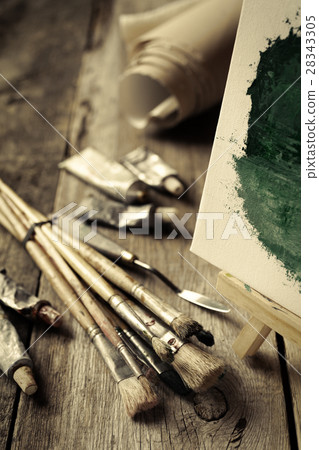 Artistic paintbrushes, paints, brushes and easel 28343305