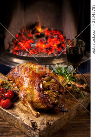 duck roasted with apple and vegetables duck roasted with apple and vegetables 28343785