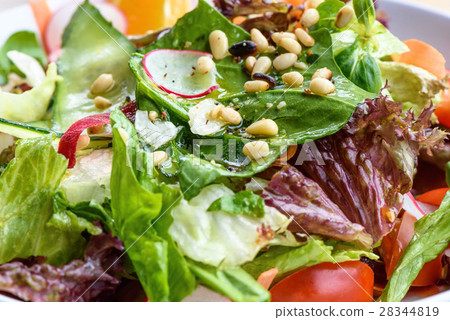 Close up photo of green healthy salad Close up photo of green healthy salad 28344819