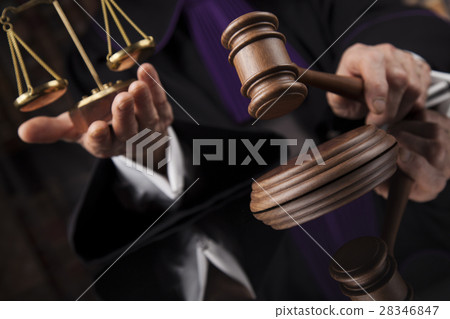 Judge, male judge in a courtroom Judge, male judge in a courtroom 28346847