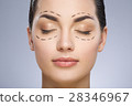 Dashed lines around closed eyes of girl 28346967